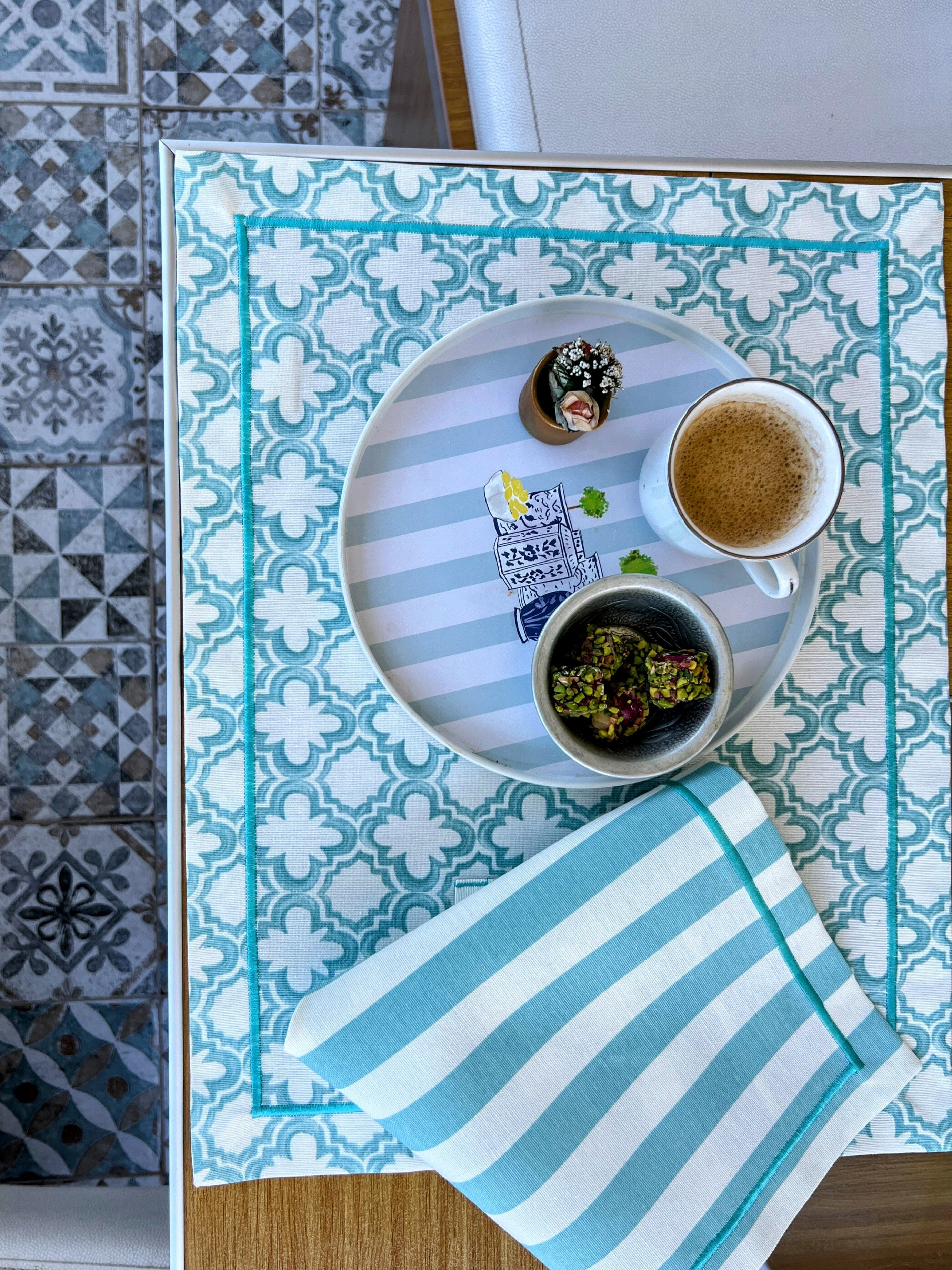 Mediterranean Mosaic table set with 4 duck linen placemats and 4 napkins in turquoise, full 8-piece set
