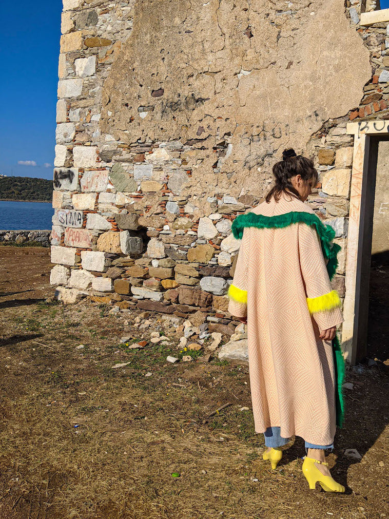 Back view of handmade pink kimono jacket highlighting relaxed fit.